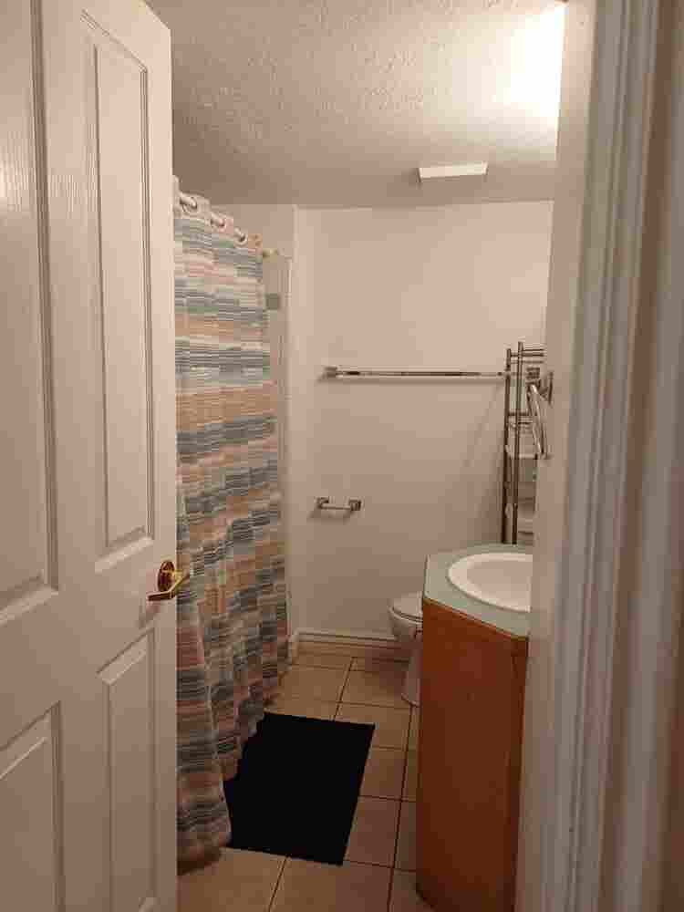 Room at Riverside Apartments