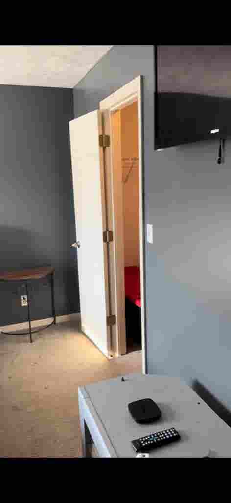 bedroom with private bathroom