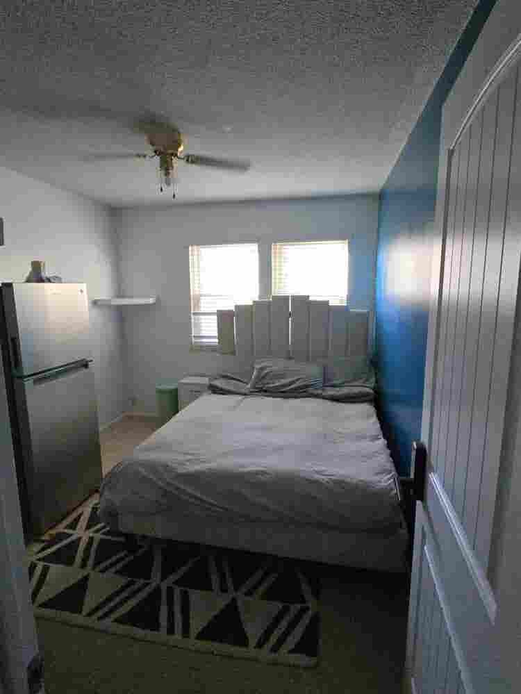 Furnished Bedroom walk in closet