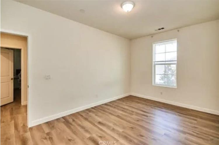 One bedroom with a shared bathroom
