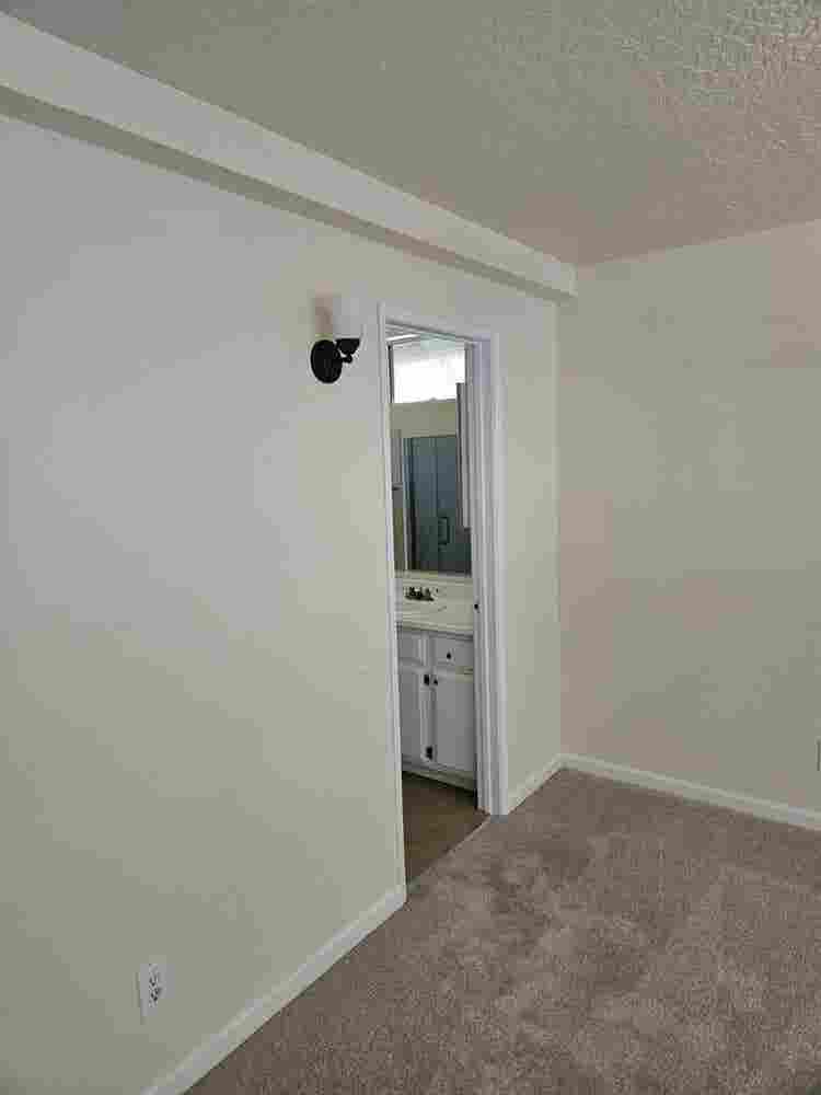 master bedroom and bathroom