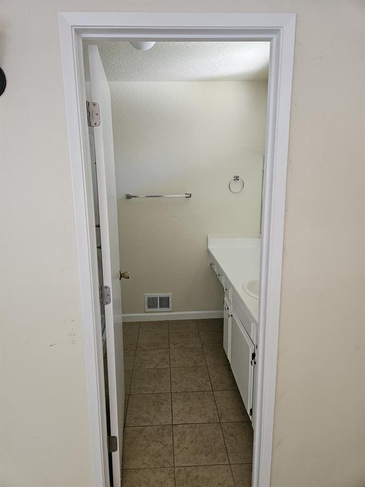 master bedroom and bathroom