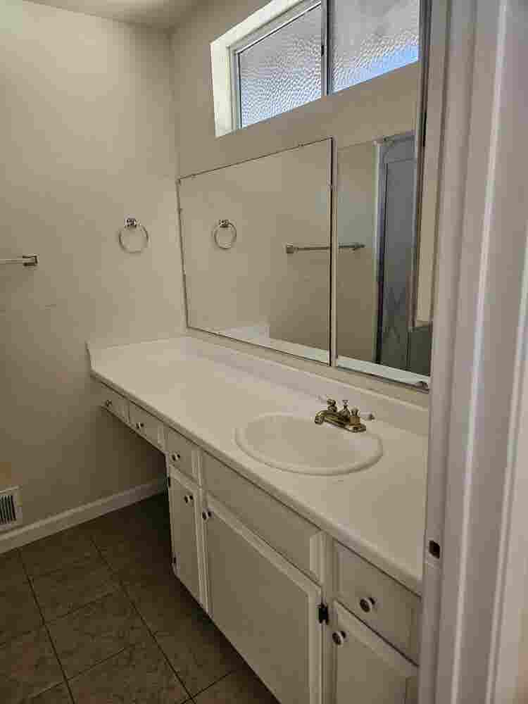 master bedroom and bathroom