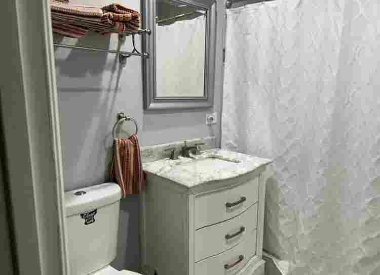 Room with shared bathroom
