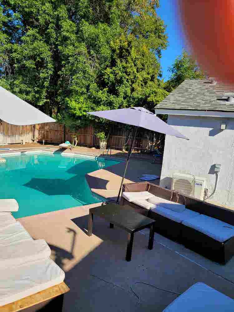 Home with a swimming pool.