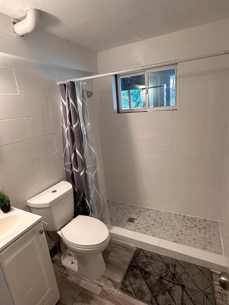 Main level room view of waterfall