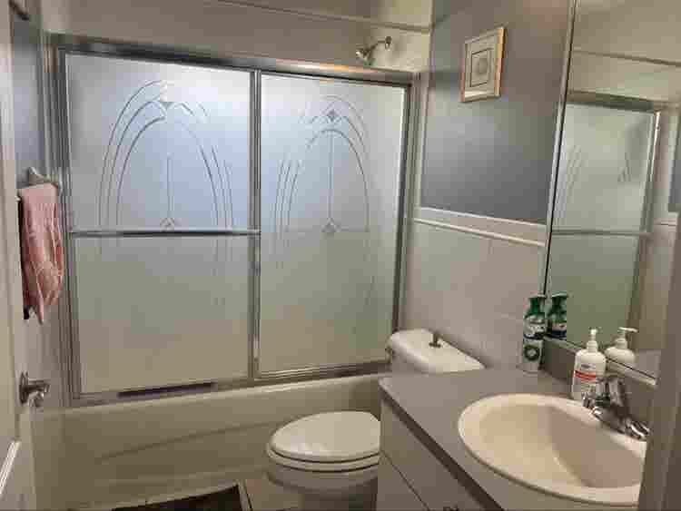 Furnished bedroom with private bath