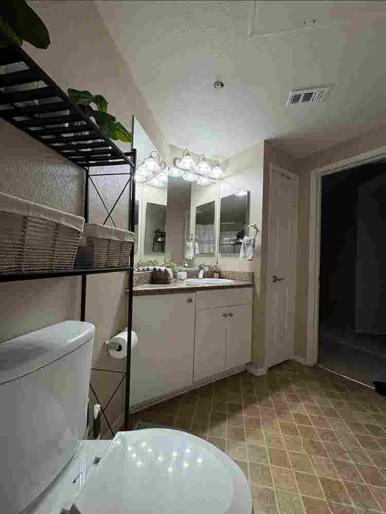 BEDROOM with shared bathroom