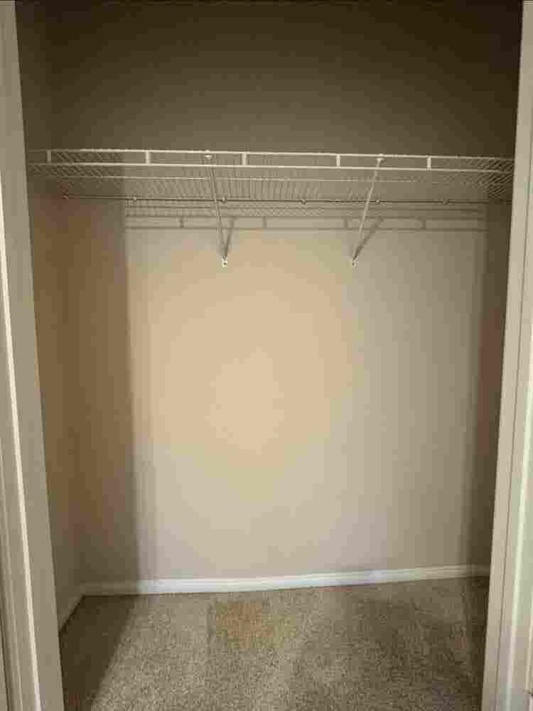 BEDROOM with shared bathroom