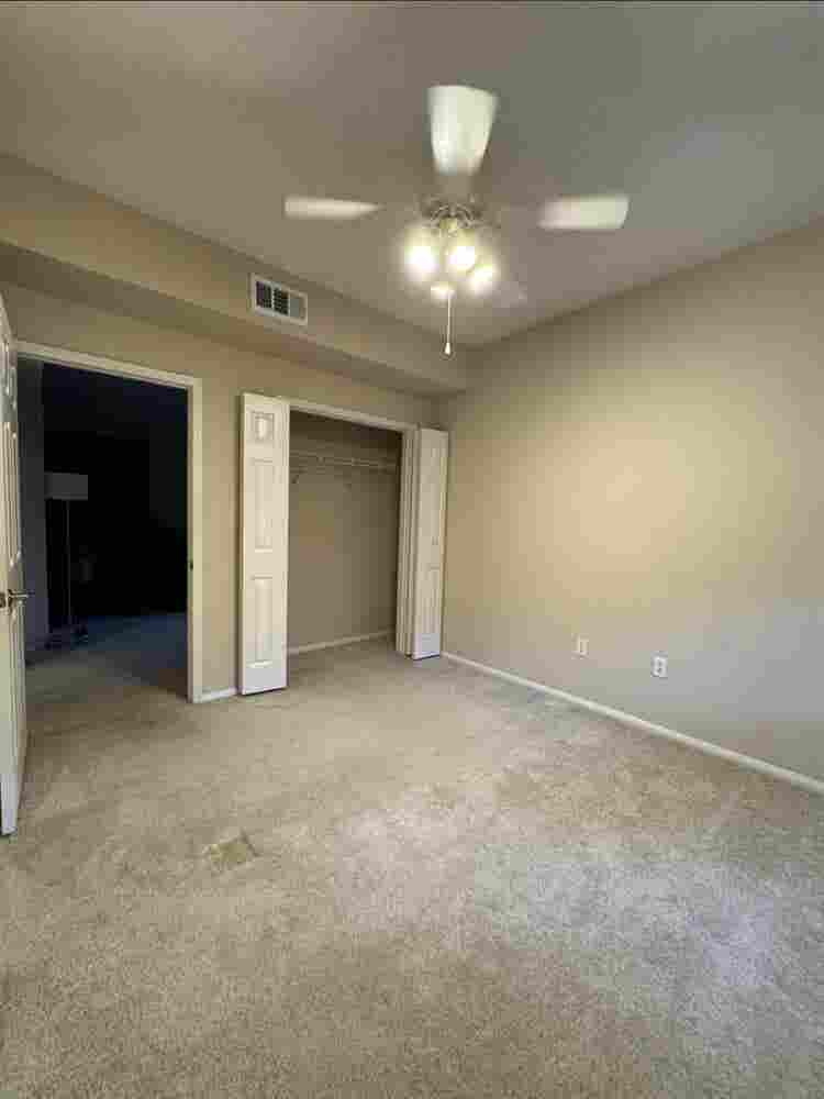 BEDROOM with shared bathroom