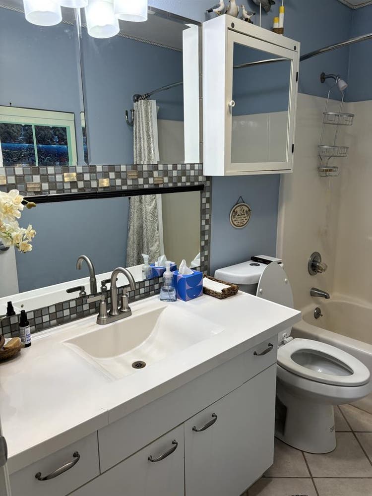 Furnished bedroom & bathroom .