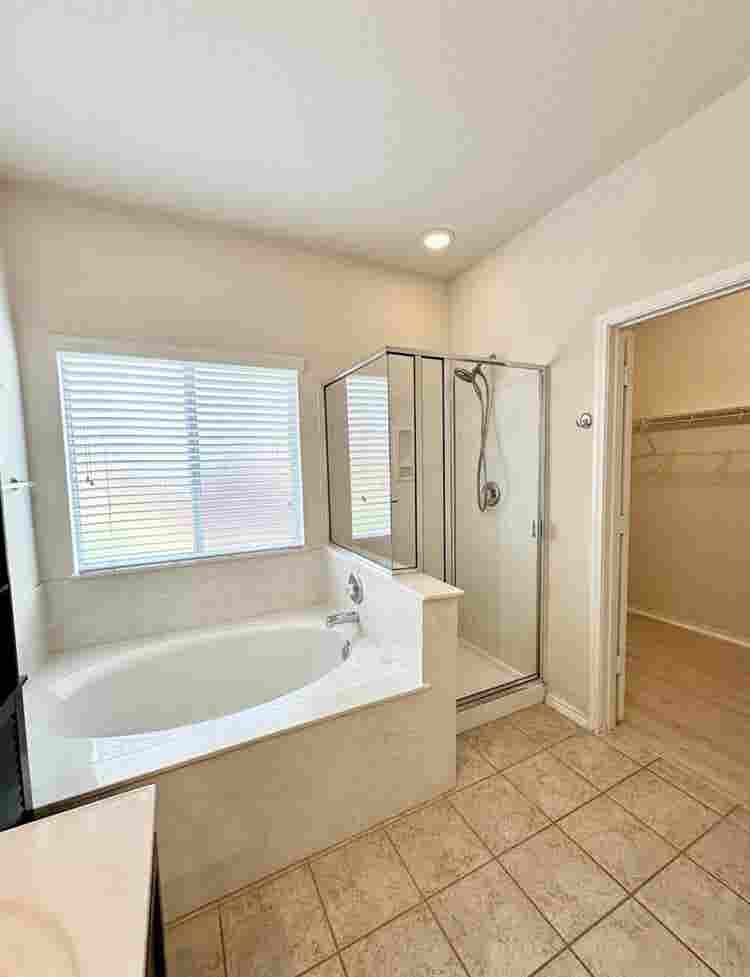 The primary suite is privately