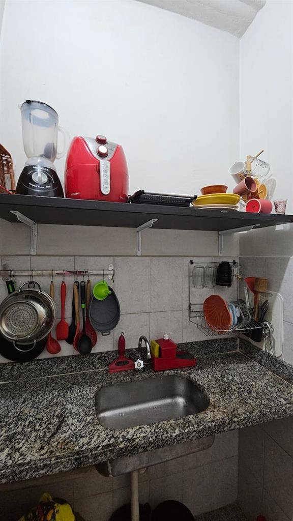 Quarto aconchegante no centro