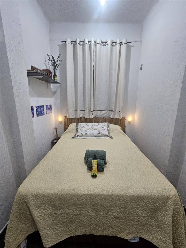 Quarto aconchegante no centro
