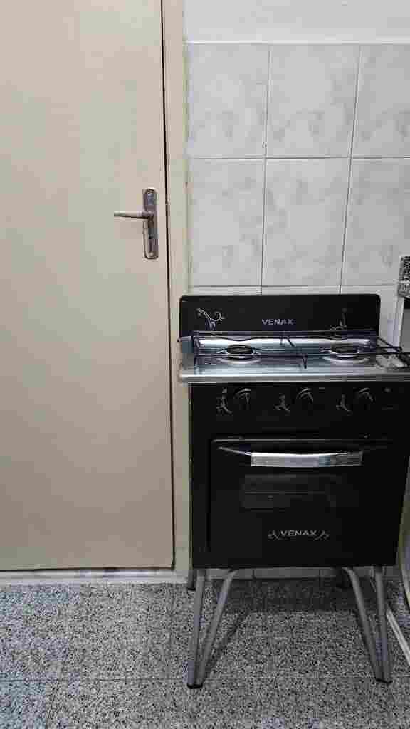 Quarto aconchegante no centro