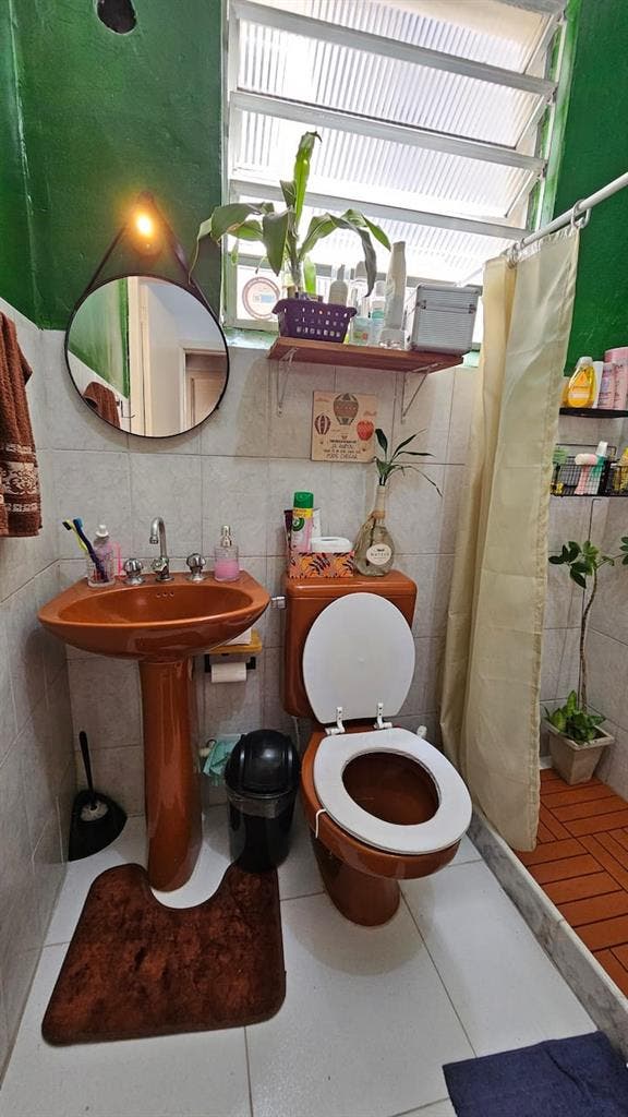 Quarto aconchegante no centro