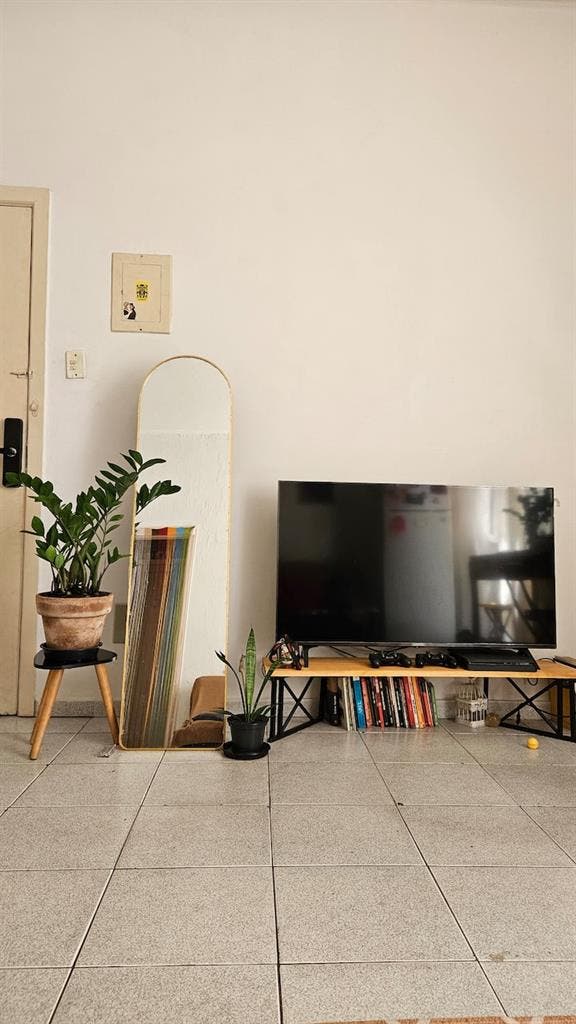 Quarto aconchegante no centro