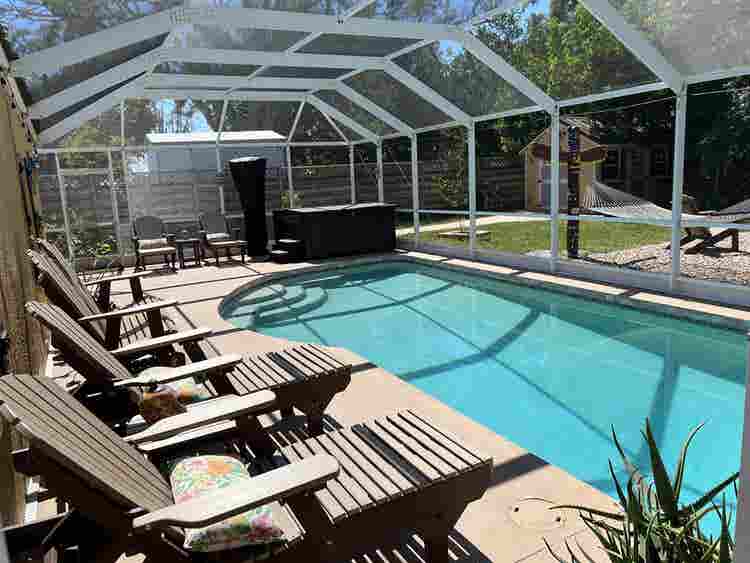 Master bed/bath with pool view