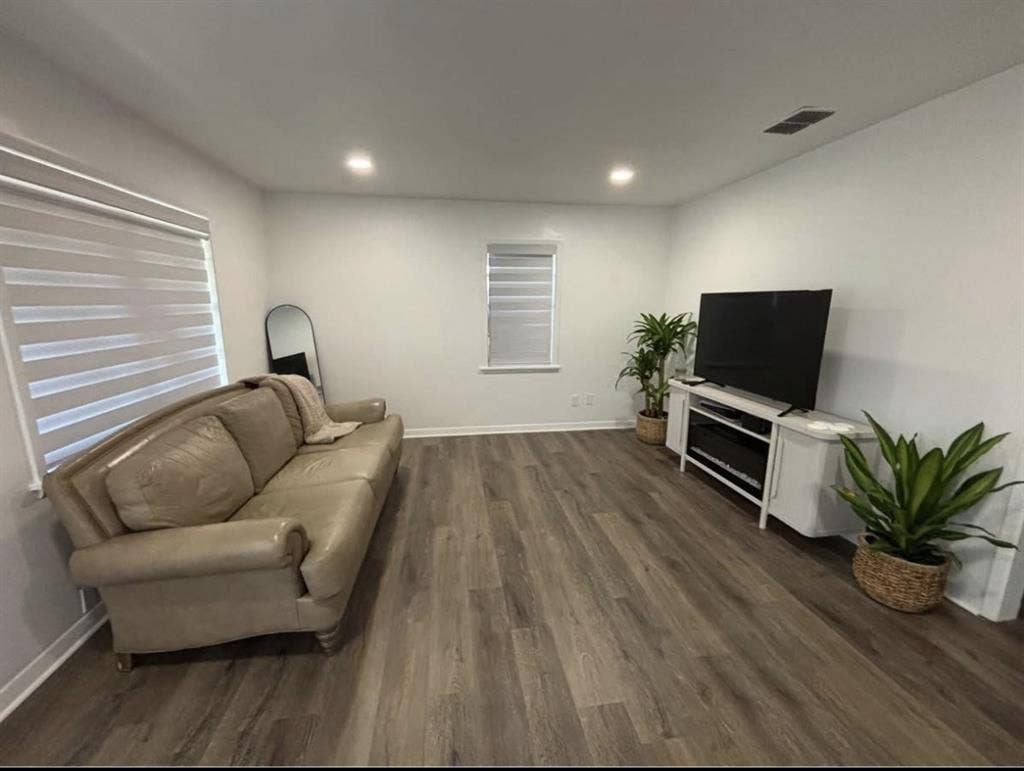 Large furnished room with bathroom