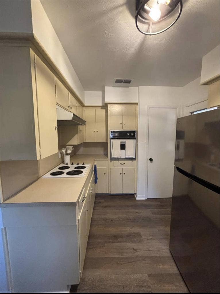 Large furnished room with bathroom