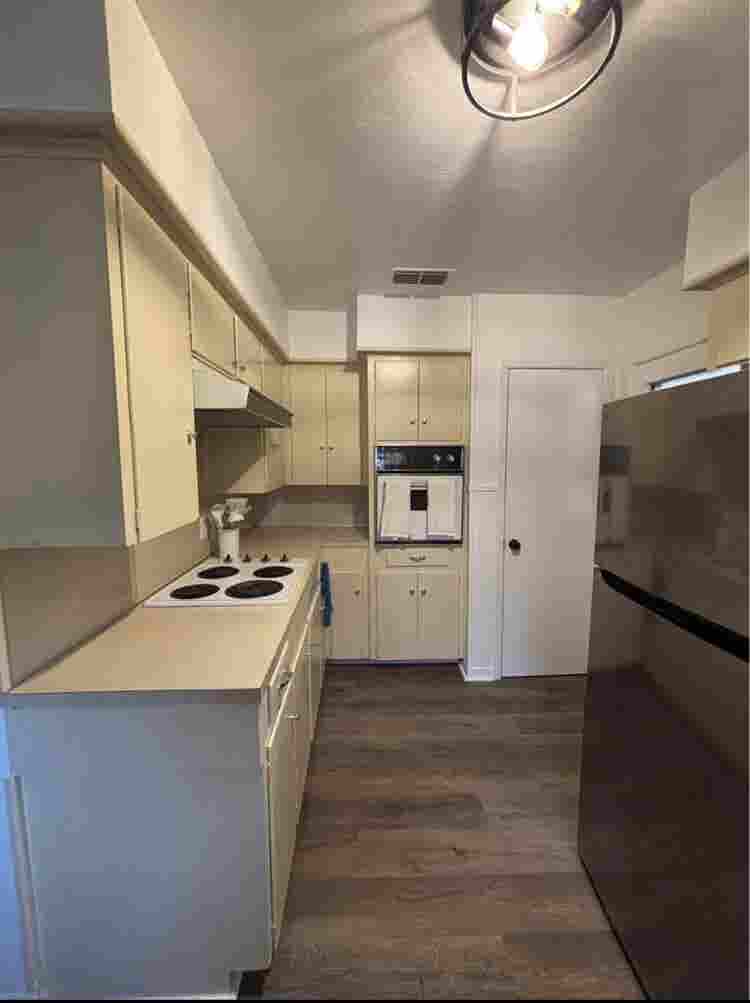 Large furnished room with bathroom