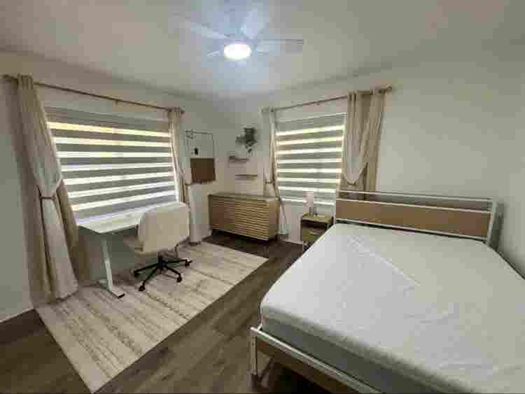 Large furnished room with bathroom
