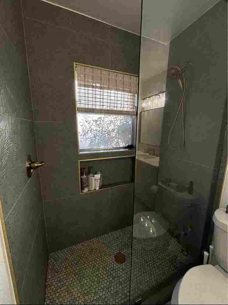 Large furnished room with bathroom