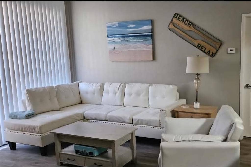 Cute condo in front of park area.