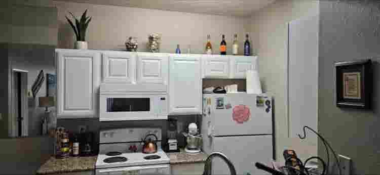 Cute condo in front of park area.