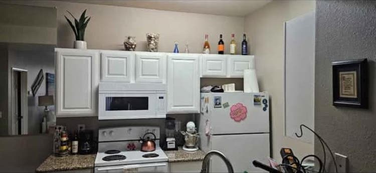 Cute condo in front of park area.