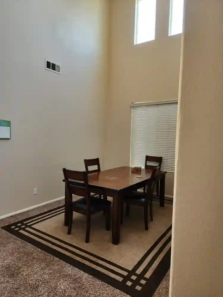 Room for rent, shared living areas.