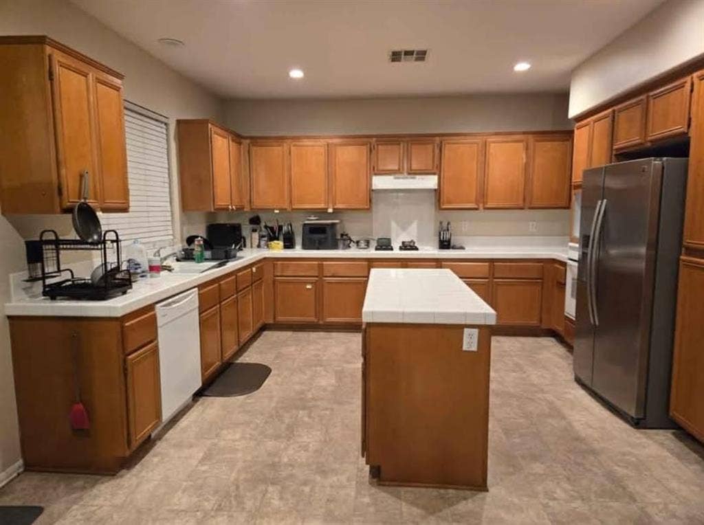 Room for rent, shared living areas.