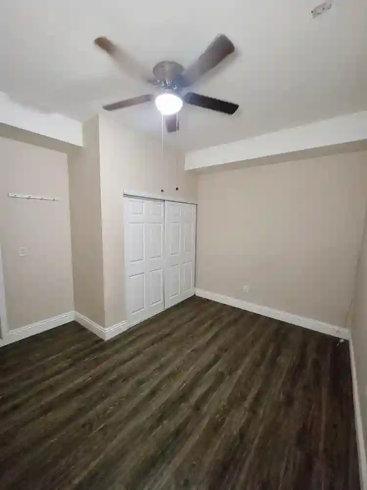 Room for rent, shared living areas.
