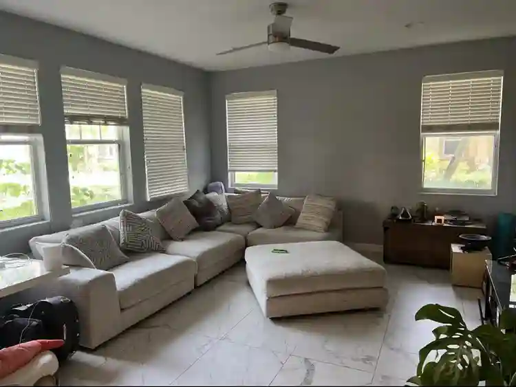 Room for rent, shared living space.