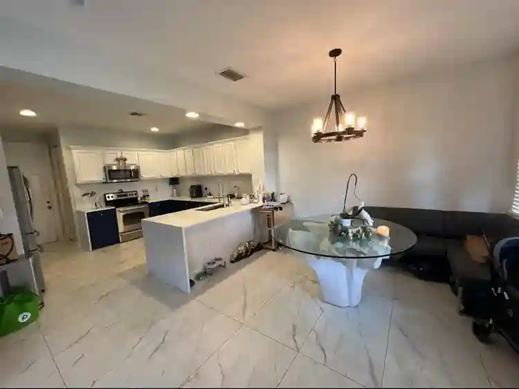 Room for rent, shared living space.