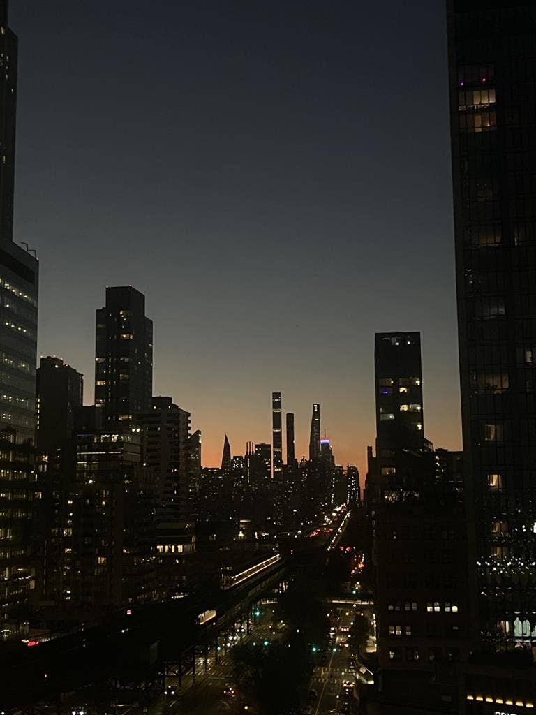 Bright room with skyline views