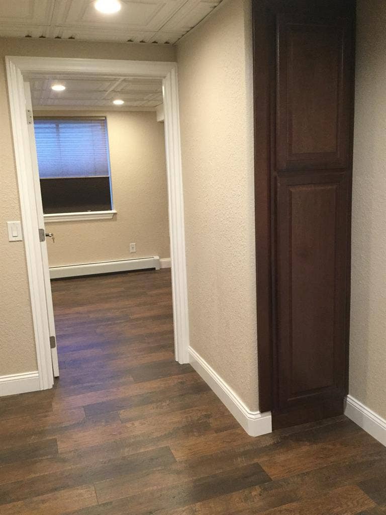 Room, private bathroom and kitchen