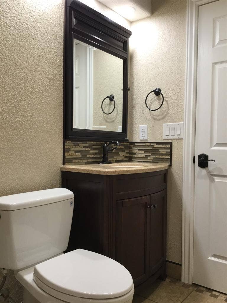 Room, private bathroom and kitchen