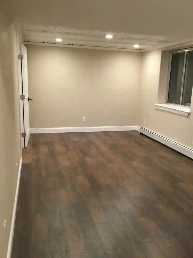 Room, private bathroom and kitchen