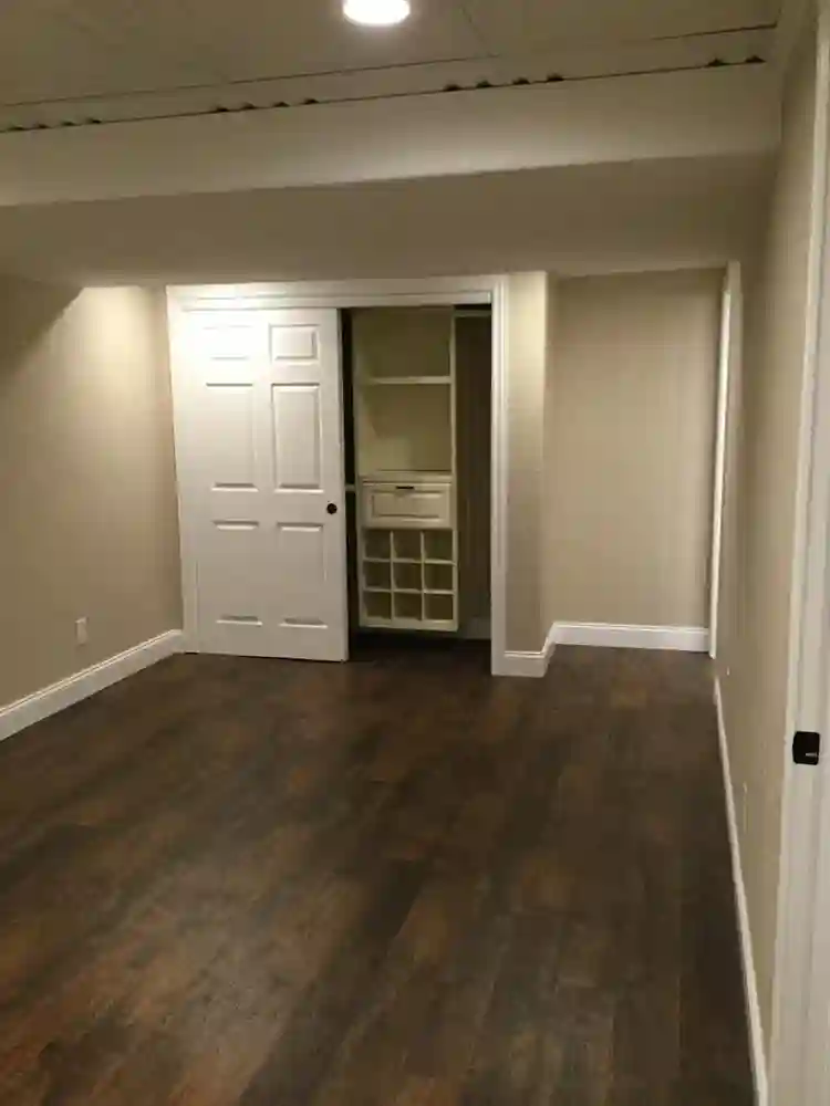 Room, private bathroom and kitchen