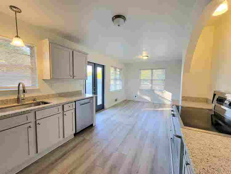 Farmhouse + acreage in the City