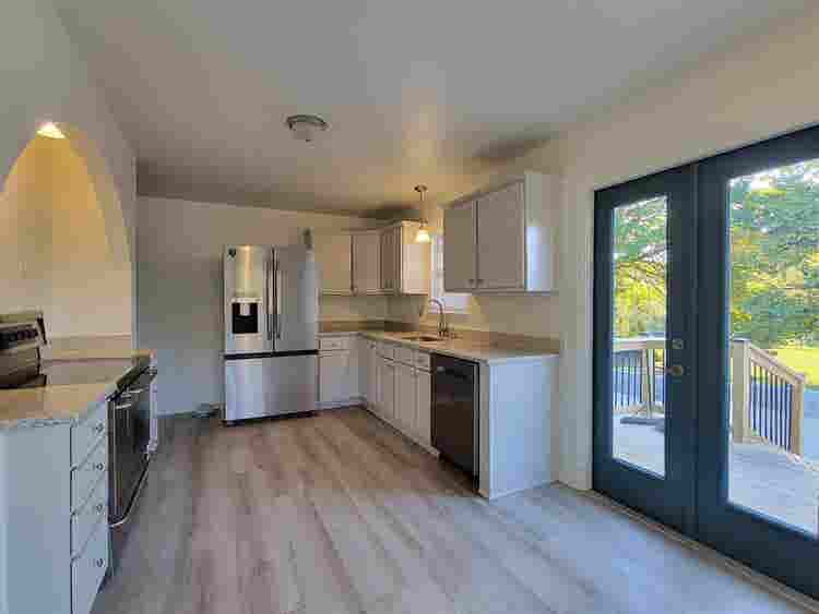 Farmhouse + acreage in the City