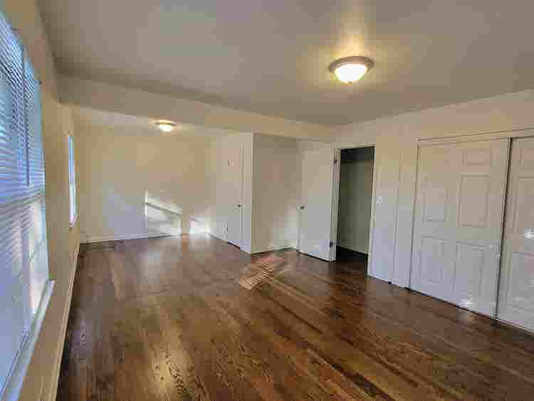 Farmhouse + acreage in the City