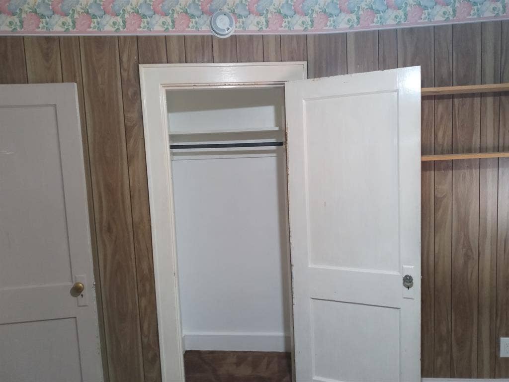 Single occupancy furnished bedroom.