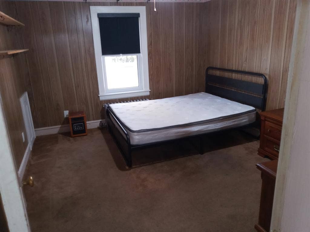Single occupancy furnished bedroom.