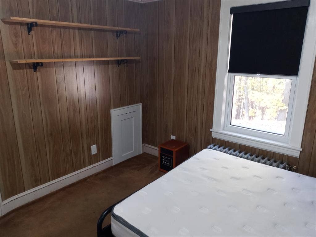Single occupancy furnished bedroom.