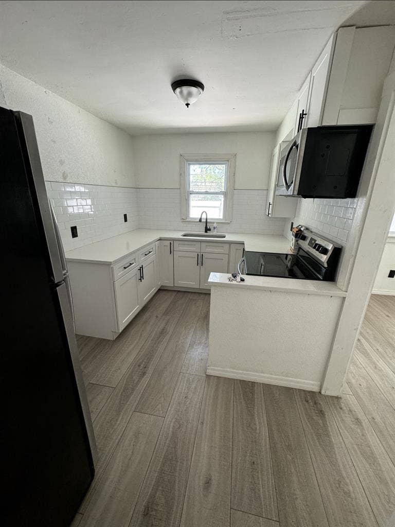 Upstairs bedroom with shared bath