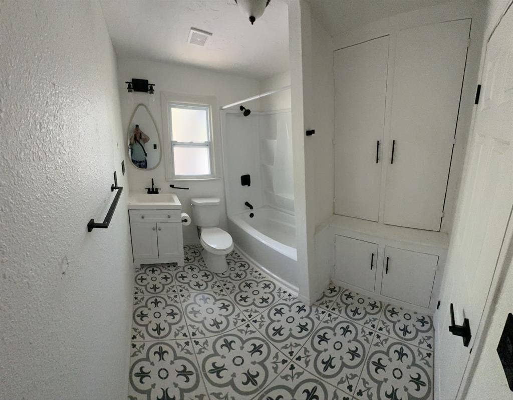 Upstairs bedroom with shared bath