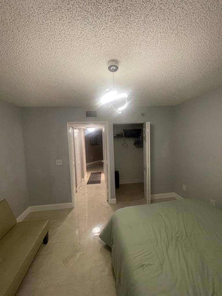 Looking for roomate in a  condo