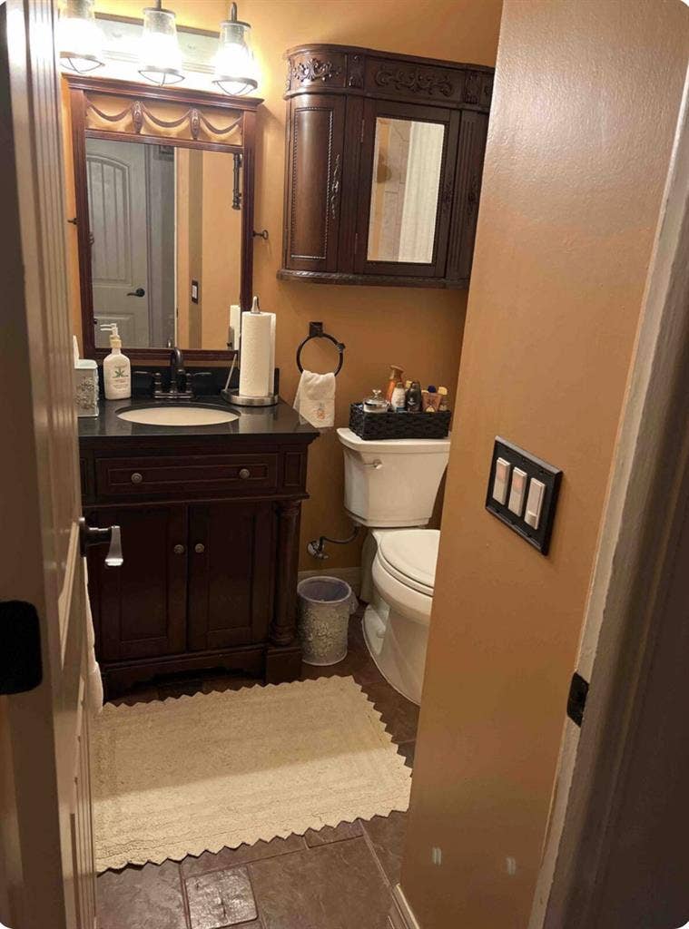 Furnished bedroom w/ private bath